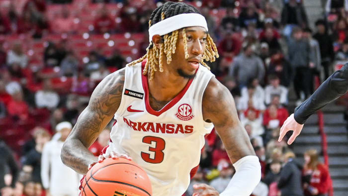 Razorbacks El Ellis brings ball up the court against Texas A&M